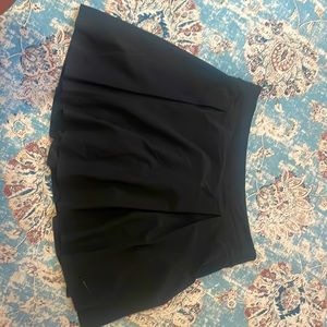 Black Nike skort only worn once. New condition.